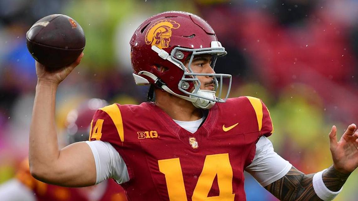  Nov 15, 2025; Los Angeles, California, USA; Southern California Trojans quarterback Jayden Maiava (14) throws against the Iowa Hawkeyes during the first half at the Los Angeles Memorial Coliseum. Mandatory Credit: Gary A. Vasquez-Imagn Images | Gary A. Vasquez-Imagn Images 