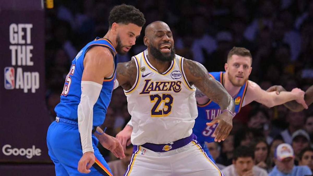  May 9, 2026; Los Angeles, California, USA; Los Angeles Lakers forward LeBron James (23) reacts as he is defended by Oklahoma City Thunder guard Ajay Mitchell (25) in the second half of game three of the second round of the 2026 NBA Playoffs at Crypto.com Arena. Mandatory Credit: Jayne Kamin-Oncea-Imagn Images | Jayne Kamin-Oncea-Imagn Images 
