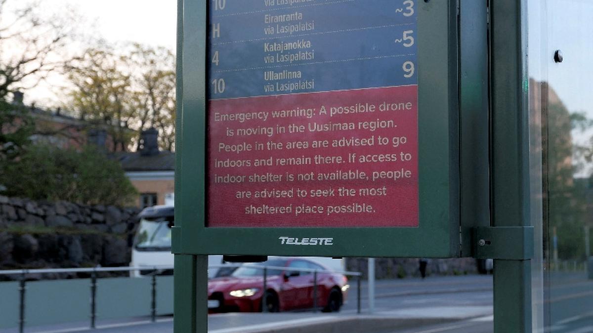 A warning about possible drone at a tram stop in Helsinki, Finland, May 15, 2026. Lehtikuva/Teemu Salonen/via REUTERS
