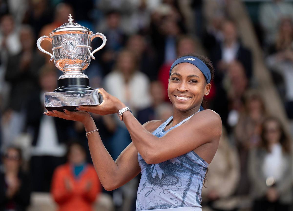  Jun 7, 2025; Paris, FR; Coco Gauff of the United States poses with the trophy after winning the women's singles final against Aryna Sabalenka on day 14 at Roland Garros Stadium. Mandatory Credit: Susan Mullane-Imagn Images 