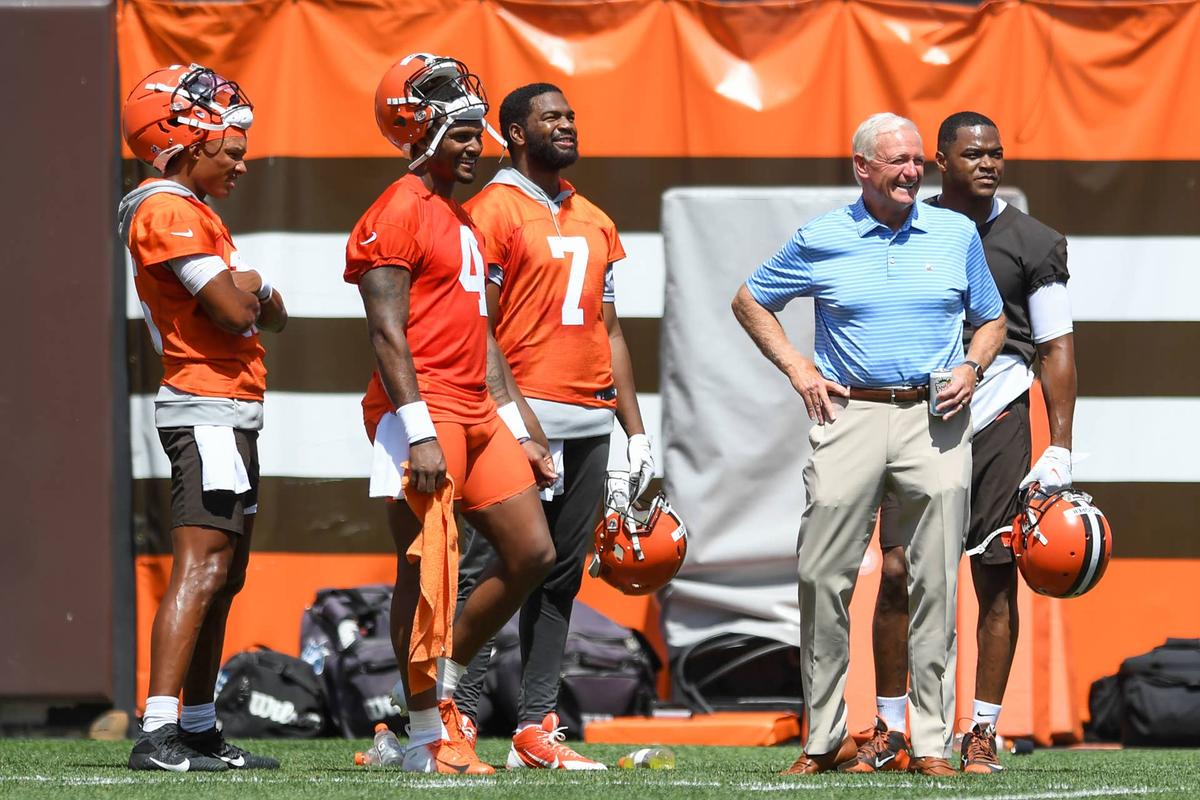  CLEVELAND, OH - JUNE 16: Managing and principal partner Jimmy Haslam of the Cleveland Browns (R) laughs with Deshaun Watson #4, Joshua Dobbs #15, Jacoby Brissett #7 and Amari Cooper #2 during the Cleveland Browns mandatory minicamp at FirstEnergy Stadium on June 16, 2022 in Cleveland, Ohio. (Photo by Nick Cammett/Getty Images) 