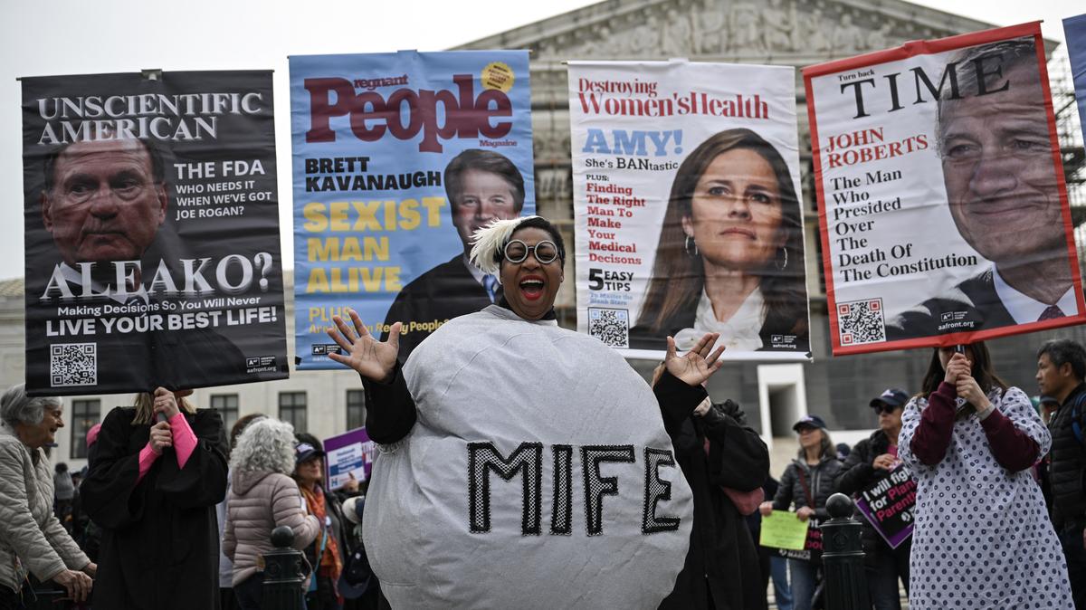 US-JUSTICE-RIGHTS. A woman dressed as a mifepristone pill dances with supporters of Planned Parenthood and pro-choice activists during a rally outside the US Supreme Court on April 2, 2025, in Washington, DC. The Supreme Court is hearing oral arguments in Medina v. Planned Parenthood South Atlantic, which could decide if states can strip Planned Parenthood of Medicaid funds.
The case addresses whether Medicaid beneficiaries can seek relief in federal court to enforce Medicaid's "free-choice of provider provision," which allows Medicaid beneficiaries to seek care from any provider that is qualified and willing to participate in the program. While the case focuses on this specific question, it has its origins in broader efforts by anti-abortion policymakers to exclude Planned Parenthood clinics from the Medicaid program and, ultimately, eliminate all federal payments to Planned Parenthood centers. (Photo by Drew ANGERER / AFP) (Photo by DREW ANGERER/AFP via Getty Images)