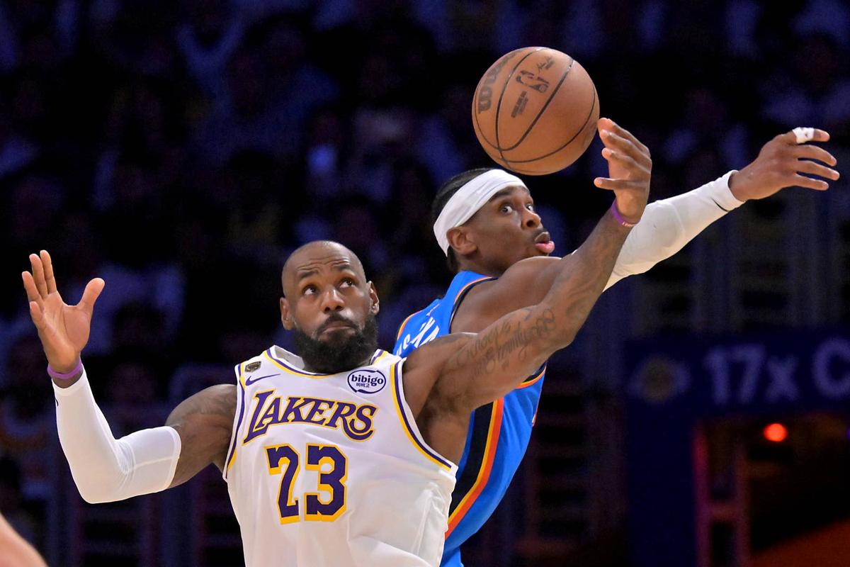  Shai Gilgeous-Alexander defends LeBron James (23) Jayne Kamin-Oncea-Imagn Images