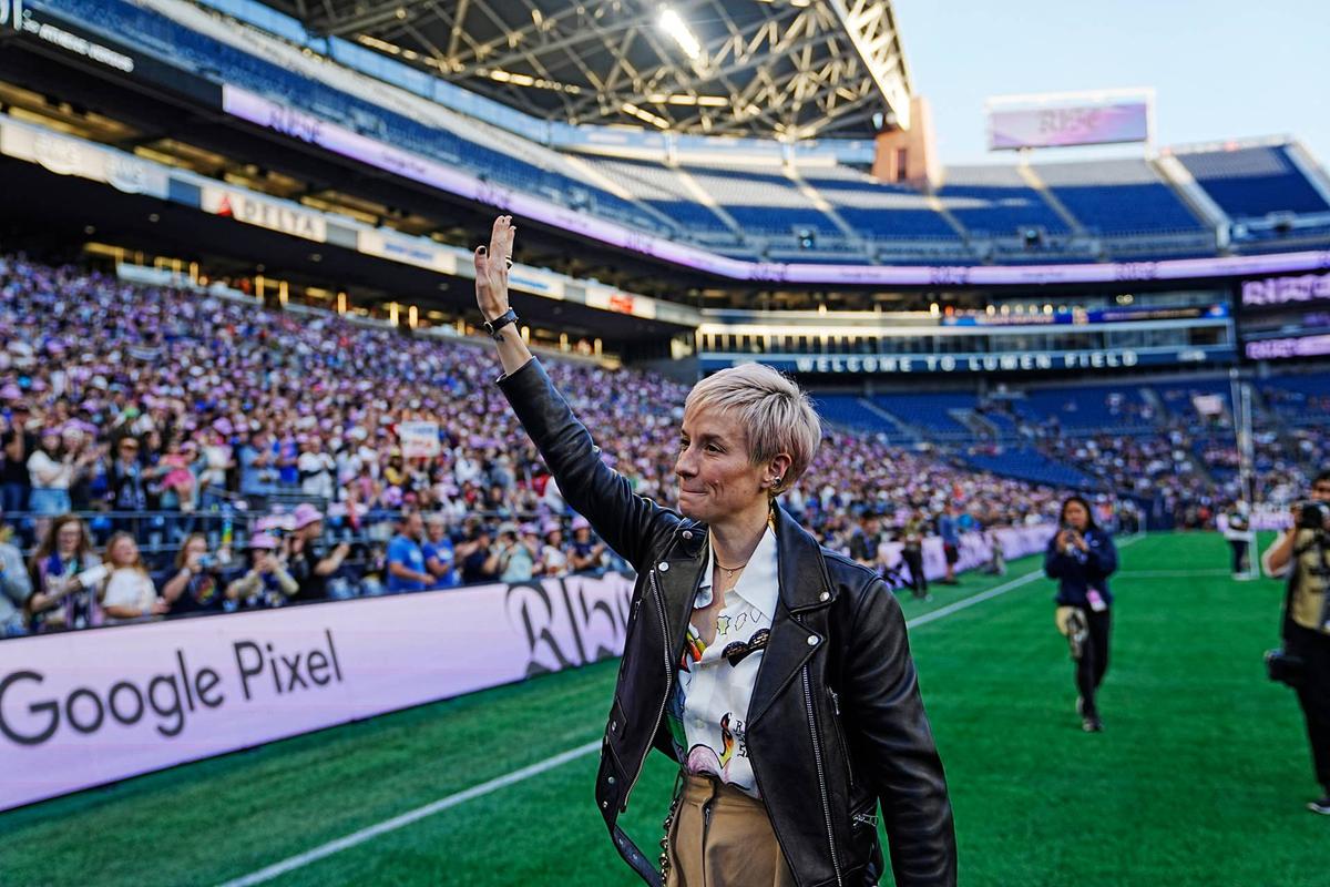  Aug 25, 2024; Seattle, Washington, USA; Megan Rapinoe reacts after retiring her jersey number before the game between Seattle Reign FC and North Carolina Courage at Lumen Field. Mandatory Credit: Stephen Brashear-USA TODAY Sports 