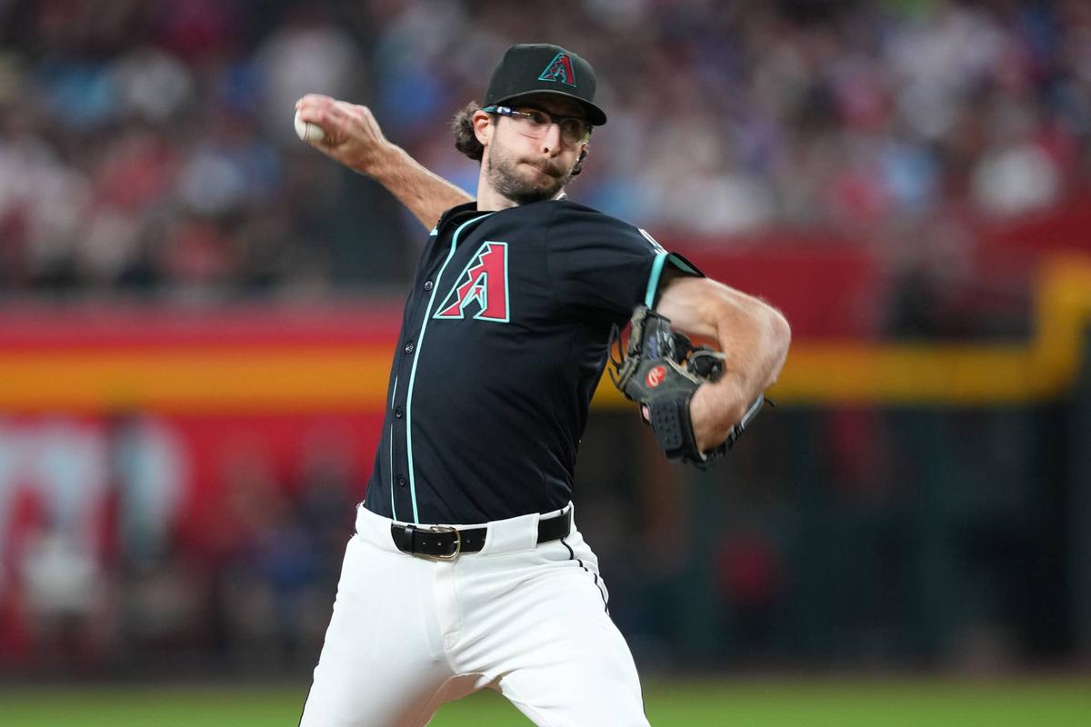  Sep 20, 2025; Phoenix, Arizona, USA; Arizona Diamondbacks pitcher Zac Gallen (23) pitches against the Philadelphia Phillies during the third inning at Chase Field. Mandatory Credit: Joe Camporeale-Imagn Images Joe Camporeale-Imagn Images