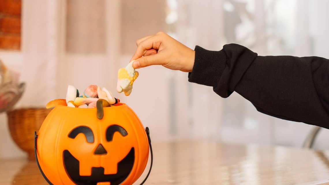 Woman's Handmade Candy Display Is the Sweetest Alternative to Spooky Halloween Decor 