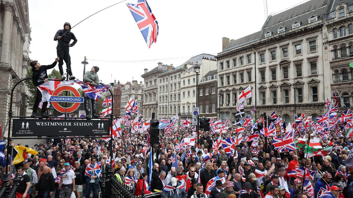 On Whitehall, supporters of British far-right activist Tommy Robinson, real name Stephen Yaxley-Lennon, take part in a march organized by Unite The Kingdom, in central London on Saturday, May 16, 2026. (Toby Shepheard/AFP/Getty Images/TNS)