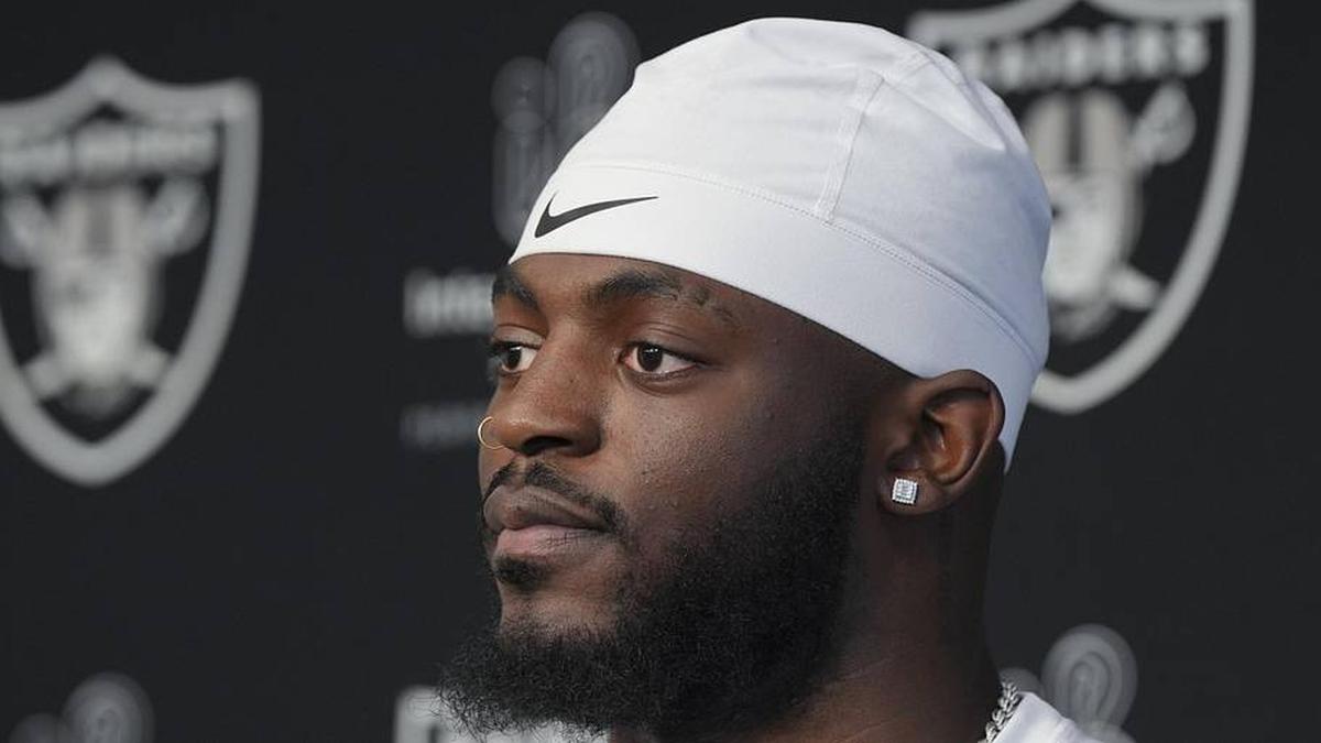  May 2, 2026; Henderson, NV, USA; Las Vegas Raiders defensive end Keyron Crawford (42) speaks during a news conference at the team's Rookie Minicamp at Intermountain Health Performance Center. Mandatory Credit: Candice Ward-Imagn Images | Candice Ward-Imagn Images 