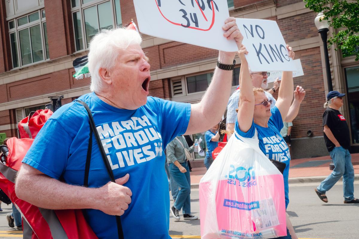 Demonstrators march to protest the Trump administration in Fort Worth, Texas, on Saturday, April 19, 2025. More than 700 events were planned for Saturday, as people turned out to speak against the administration’s handling of immigration, civil liberties and federal job cuts. (Desiree Rios/The New York Times)