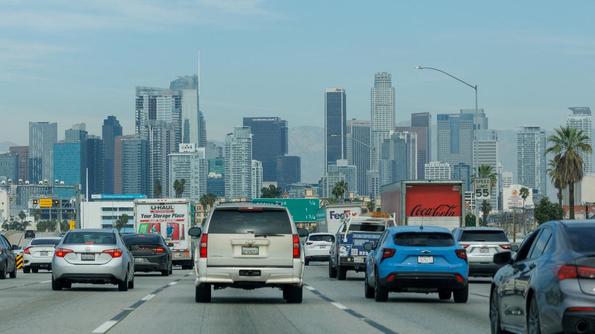FILE PHOTO: Traffic makes its way into downtown Los Angeles, California, U.S., February 24,  2026.  REUTERS/Mike Blake/File Photo