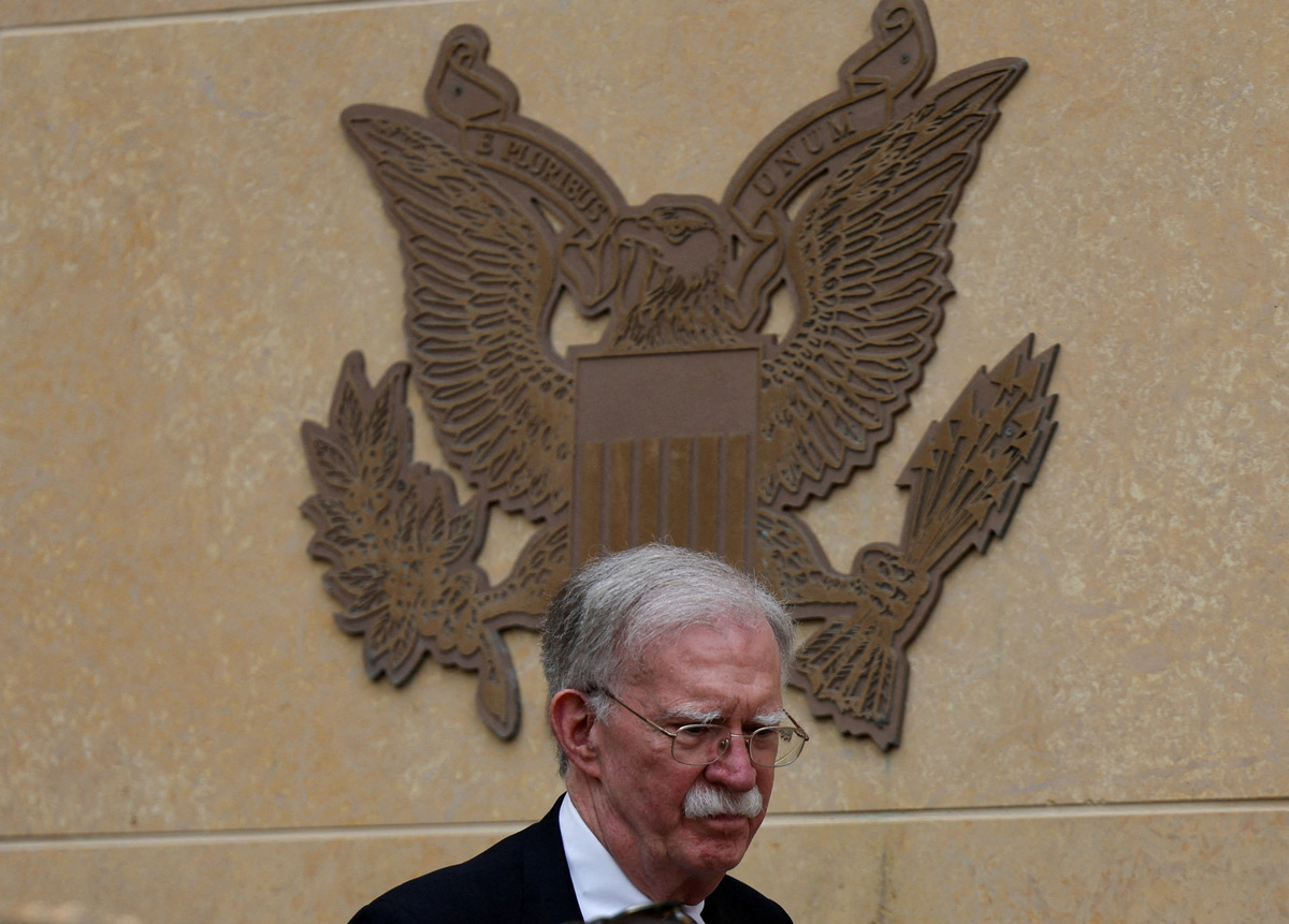 Former White House national security adviser John Bolton leaves the U.S. District Court for the District of Maryland, in Greenbelt, Maryland, U.S., June 26, 2026. REUTERS/Tom Brenner