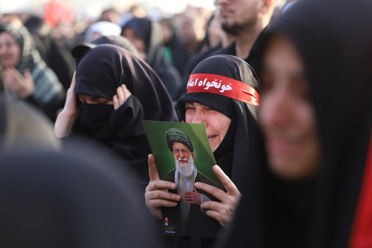 People attend a funeral procession for Iran's late Supreme Leader Ayatollah Ali Khamenei, who was killed on February 28 in Israeli and U.S. airstrikes, in Qom, Iran July 7, 2026. Mohammad Asadi/ISNA/via WANA (West Asia News Agency)via REUTERS