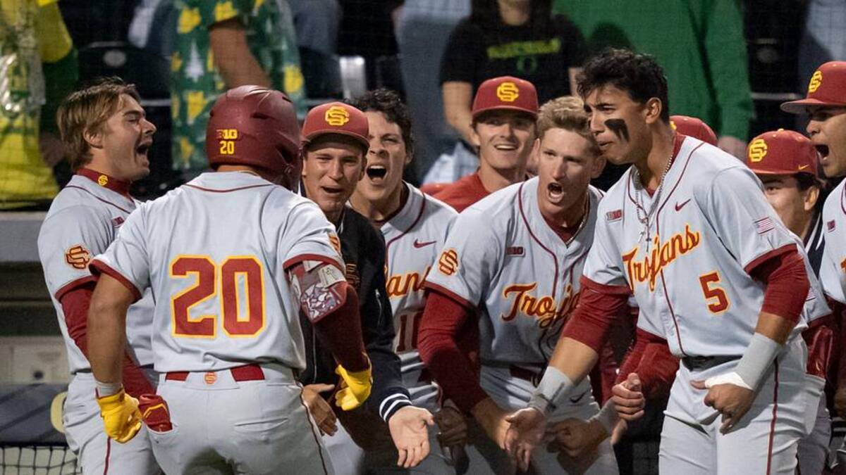  USC celebrates a home run by Isaac Cadena (20) as the Oregon Ducks host the USC Trojans on May 14, 2026, in Eugene, Oregon. | Ben Lonergan/The Register-Guard / USA TODAY NETWORK via Imagn Images 