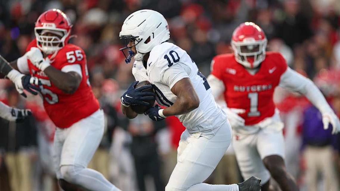  Nov 29, 2025; Piscataway, New Jersey, USA; Penn State Nittany Lions running back Nicholas Singleton (10) carries the ball against the Rutgers Scarlet Knights during the first half at SHI Stadium. Mandatory Credit: Vincent Carchietta-Imagn Images | Vincent Carchietta-Imagn Images 