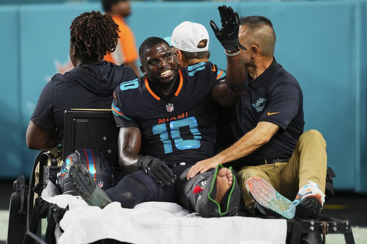 MIAMI GARDENS, FL - SEPTEMBER 29: Tyreek Hill#10 of the Miami Dolphins is carted off the field after suffering an injury against the New York Jets during an NFL football game at Hard Rock Stadium on September 29, 2025 in Miami Gardens, Florida. (Photo by Cooper Neill/Getty Images)