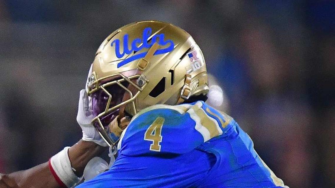  Nov 8, 2025; Pasadena, California, USA; Nebraska Cornhuskers wide receiver Nyziah Hunter (13) runs the ball against UCLA Bruins defensive back Key Lawrence (4) during the second half at the Rose Bowl. Mandatory Credit: Gary A. Vasquez-Imagn Images | Gary A. Vasquez-Imagn Images 