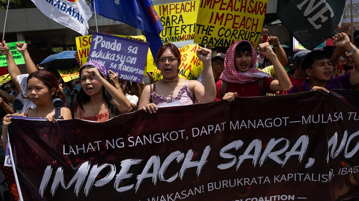 Protesters call for the impeachment of Philippine Vice President Sara Duterte ahead of a vote in the House of Representatives on whether to transmit the impeachment complaint to the Senate, outside the House of Representatives in Quezon City, Philippines, May 11, 2026. REUTERS/Eloisa Lopez