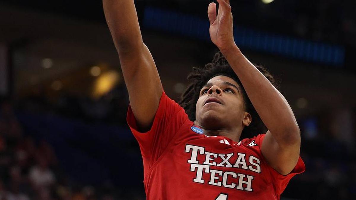  Mar 22, 2026; Tampa, FL, USA; Texas Tech Red Raiders guard Christian Anderson (4) makes a layup against the Alabama Crimson Tide in the first half during a second round game of the men's 2026 NCAA Tournament at Benchmark International Arena. Mandatory Credit: Nathan Ray Seebeck-Imagn Images | Nathan Ray Seebeck-Imagn Images 