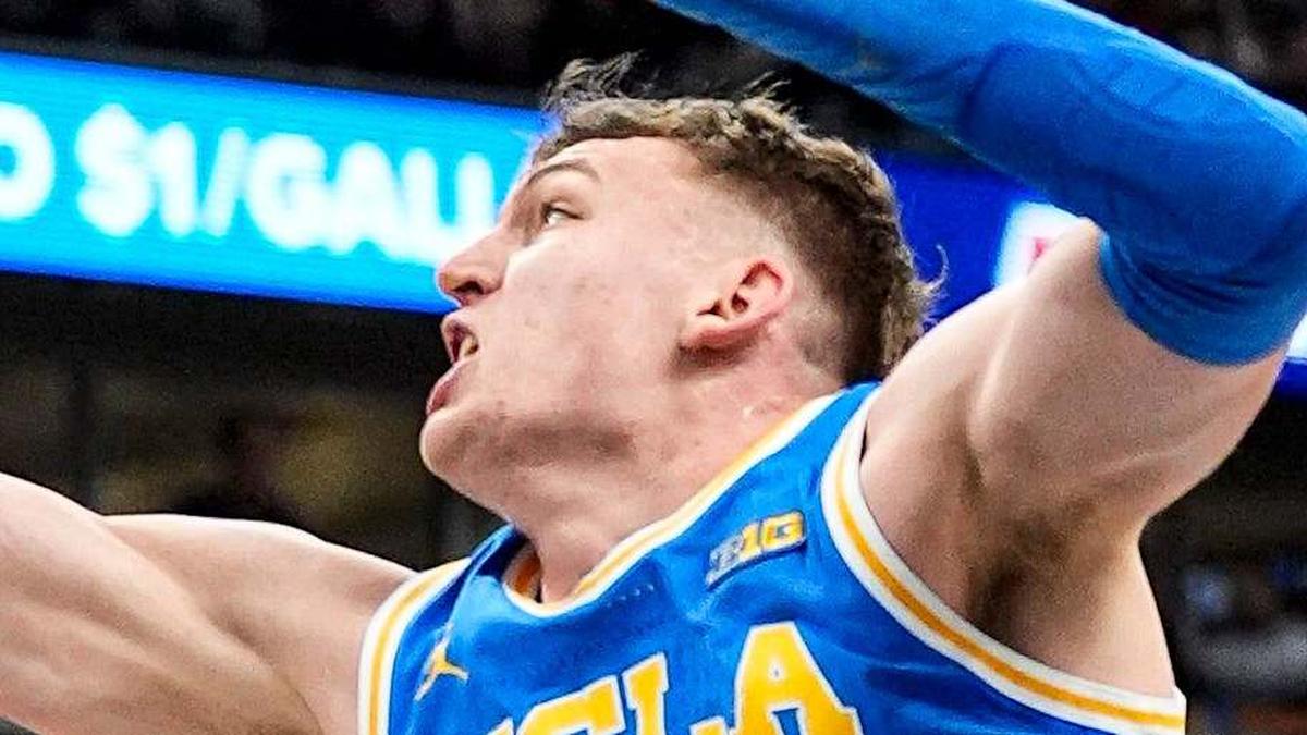  Michigan State center Carson Cooper (15) and UCLA forward Tyler Bilodeau (34) battle for the rebound during the first half of Big Ten tournament quarterfinal at United Center in Chicago on Friday, March 13, 2026. | Junfu Han / USA TODAY NETWORK via Imagn Images 