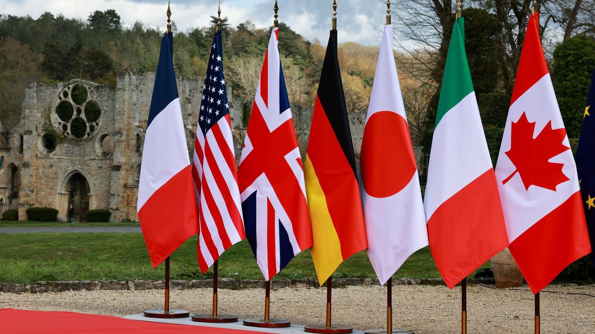 The flags of France, U.S., Britain, Germany, Japan, Italy and Canada on the day of the G7 Foreign Ministers' Meeting at Vaux-de-Cernay Abbey in Cernay-la-Ville near Paris, France, March 26, 2026. REUTERS/Stephanie Lecocq