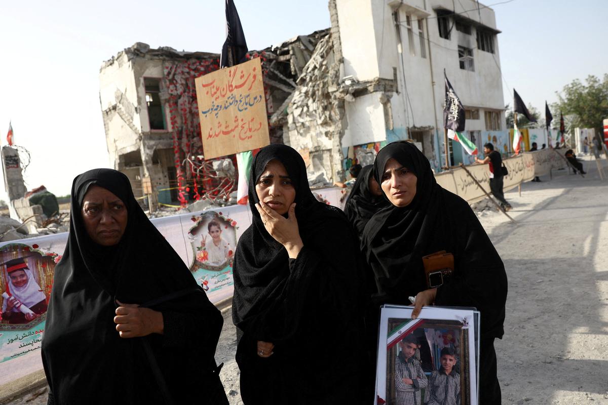 Raheleh, an Iranian woman who lost two of her children in Minab school strike on February 28, reacts at Minab school in Minab, Iran, May 21, 2026. Majid Asgaripour/WANA (West Asia News Agency) via REUTERS
