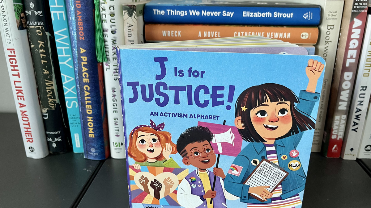 Children’s book “J is for Justice: An Activism Alphabet,” by Chicago-based writer Veronica Arreola, appears on PEN America’s latest list of banned books. (Heidi Stevens/TNS)