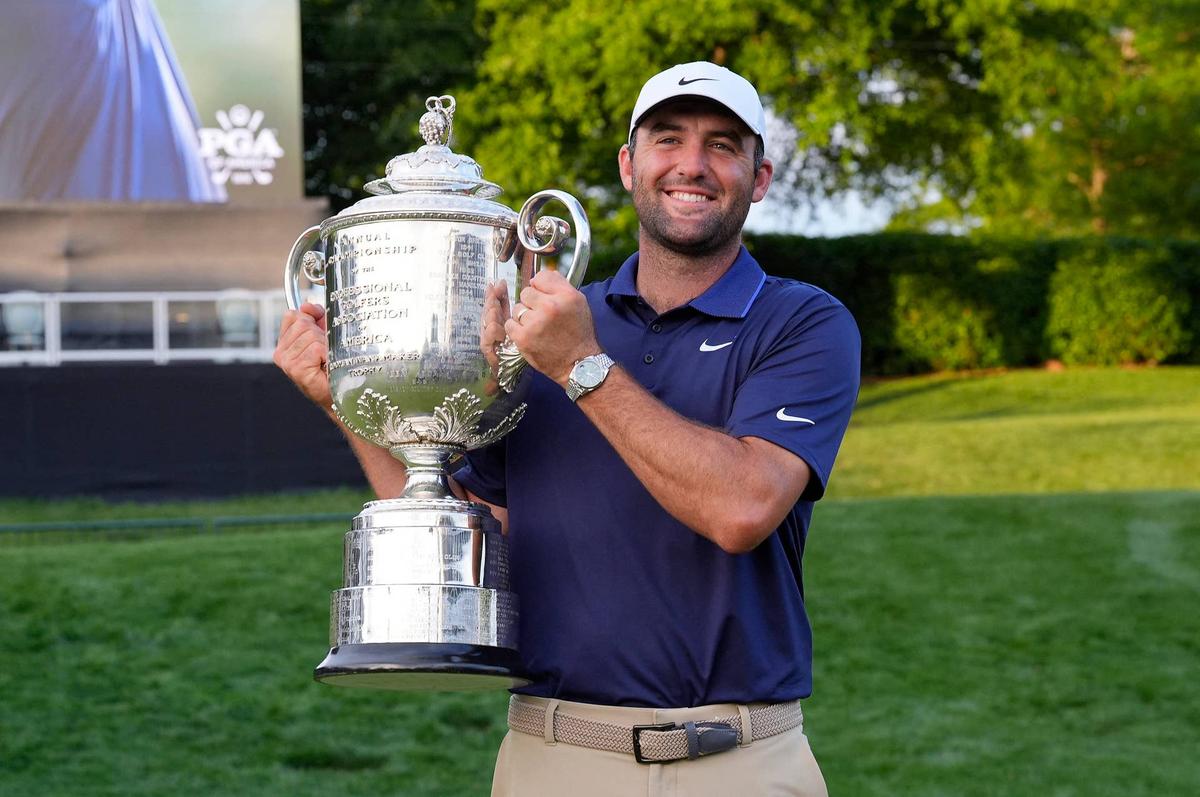 Scottie Scheffler poses with the Wanamaker Trophy after winning the PGA Championship at Quail Hollow in Charlotte, North Carolina, on May 18, 2025. Jim Dedmon-Imagn Images