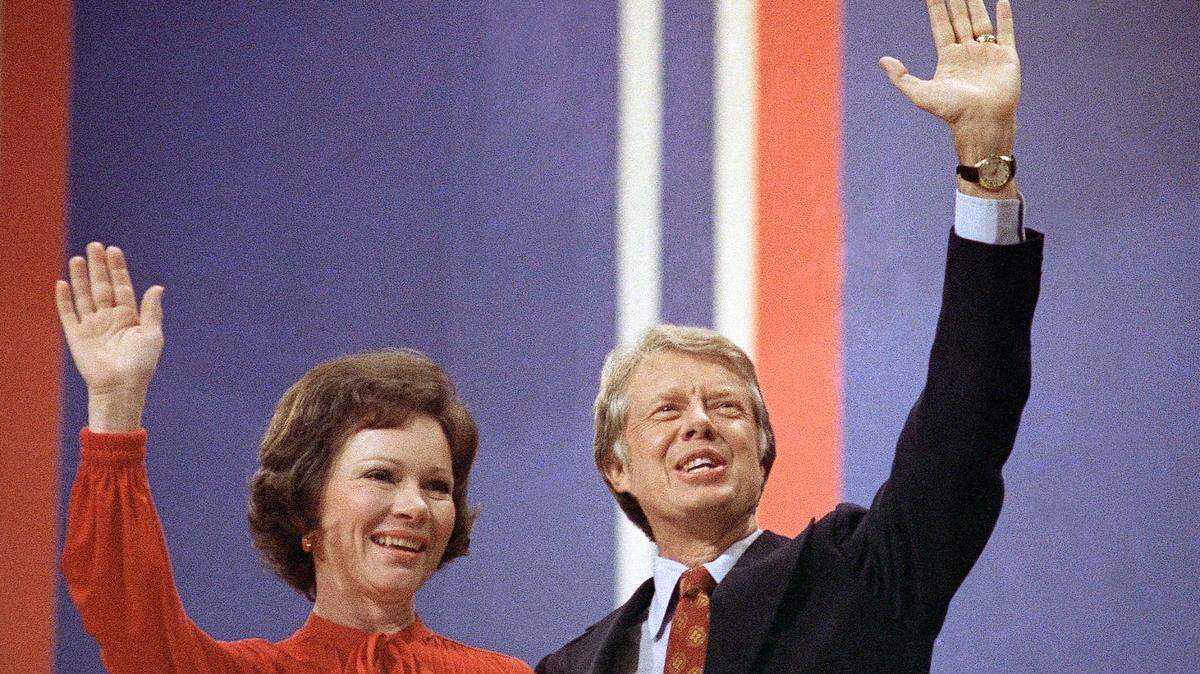 FILE - Jimmy Carter, right, and his wife, Rosalynn Carter, wave together at the National Convention in Madison Square Garden, July 15, 1976, in New York. Rosalynn Carter, the closest adviser to Jimmy Carter during his one term as U.S. president and their four decades thereafter as global humanitarians, died Sunday, Nov. 19, 2023. She was 96. (AP Photo, File)