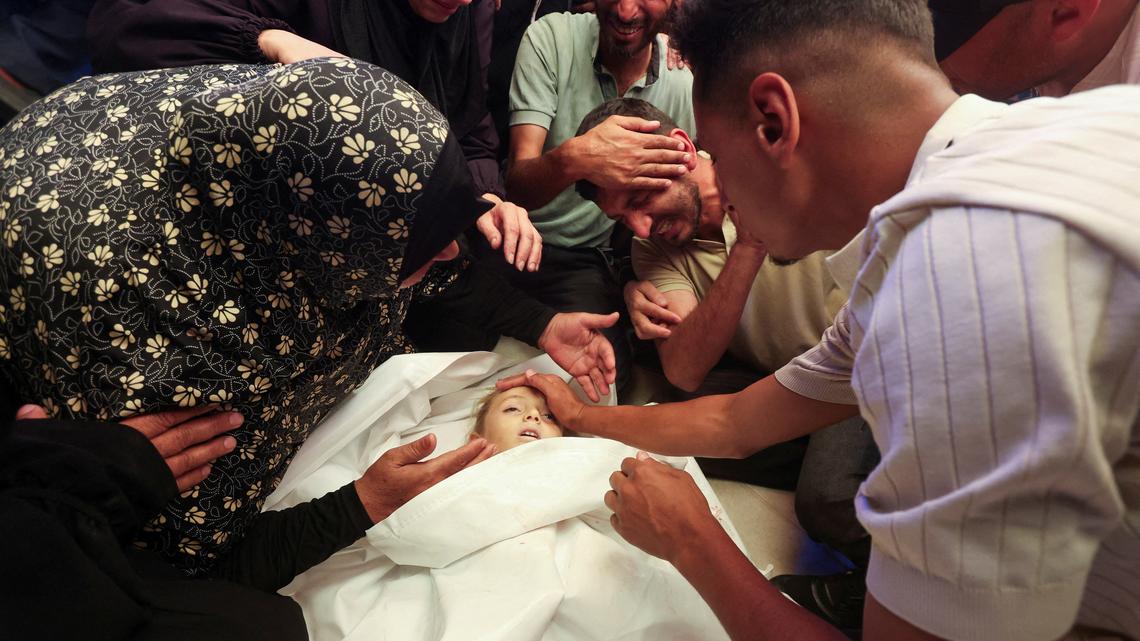 Israeli fire kills six-year-old girl and a woman in Gaza, medics say 