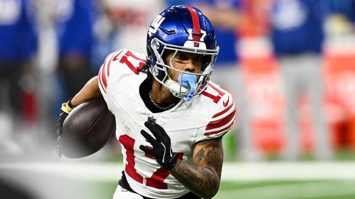  New York Giants wide receiver Wan'Dale Robinson (17) runs upfield after catching a swing pass in the second quarter against the Detroit Lions at Ford Field. | Lon Horwedel-Imagn Images 