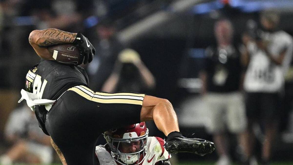  Sep 13, 2025; West Lafayette, Indiana, USA; Purdue Boilermakers wide receiver Michael Jackson III (2) is tackled by USC Trojans linebacker Desman Stephens II (23) during the second half at Ross-Ade Stadium. Mandatory Credit: Marc Lebryk-Imagn Images | Marc Lebryk-Imagn Images 