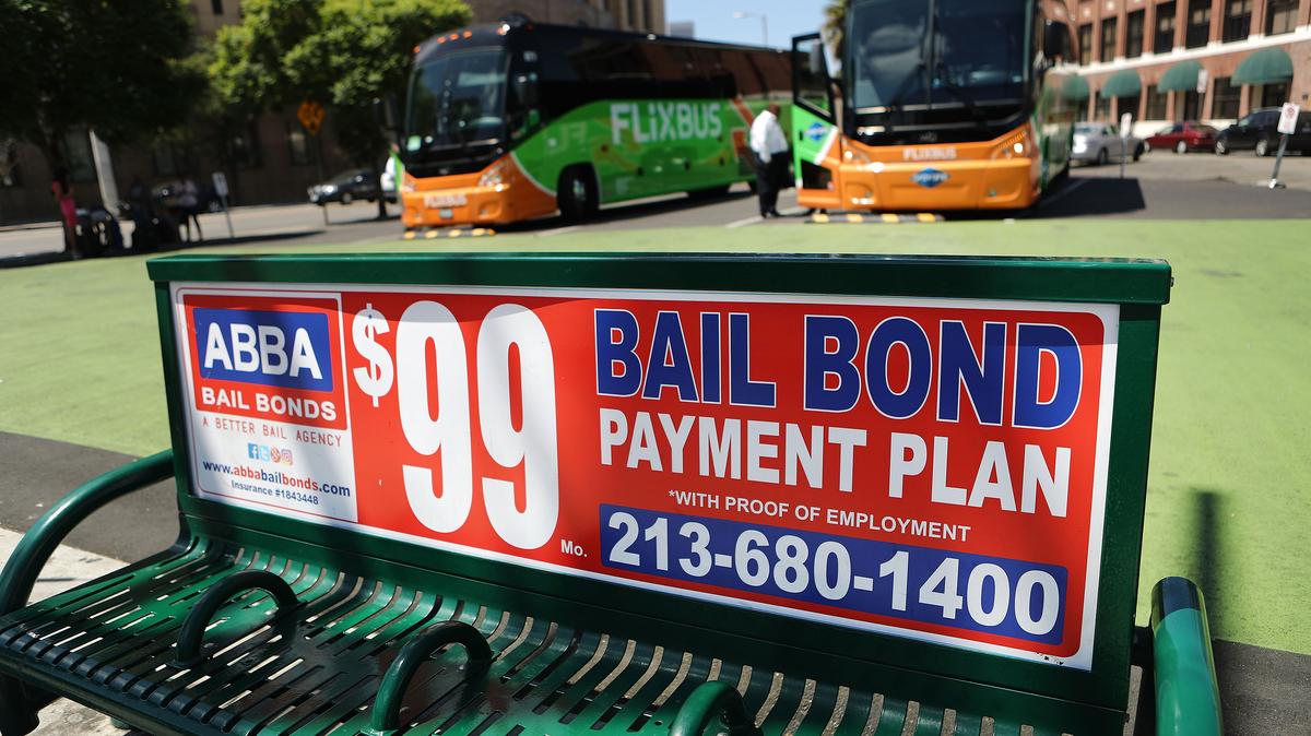 A sign advertises a bail bond company on Aug. 29, 2018, in Los Angeles. California Governor Jerry Brown signed a bill yesterday which will make California the first state to abolish bail for suspects who are awaiting trial.  (Mario Tama/Getty Images/TNS)