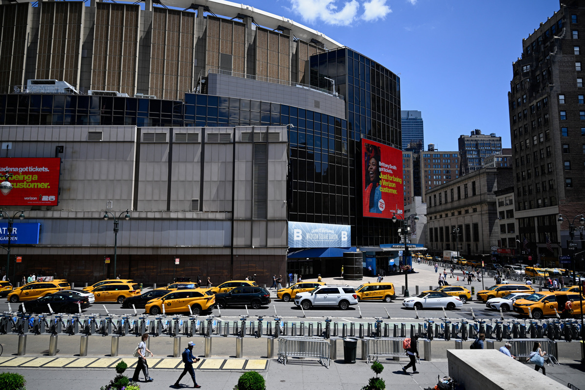 People walk past Madison Square Garden in Manhattan, in New York City, U.S., June 24, 2026.   REUTERS/Vincent Alban