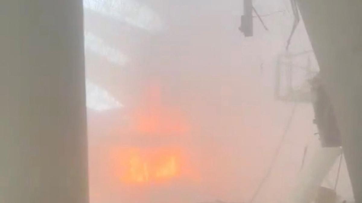 Debris lies on the floor as fire burns in the background, in the aftermath of Iranian strikes, according to the foreign ministry, at Kuwait International Airport in Kuwait City, Kuwait, June 3, 2026, in this still image obtained from a social media video.  Social Media/via REUTERS