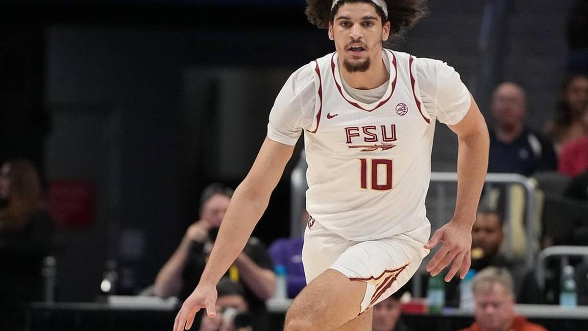  Mar 11, 2026; Charlotte, NC, USA; Florida State Seminoles guard Lajae Jones (10) with the ball in the second half at Spectrum Center. Mandatory Credit: Bob Donnan-Imagn Images | Bob Donnan-Imagn Images 