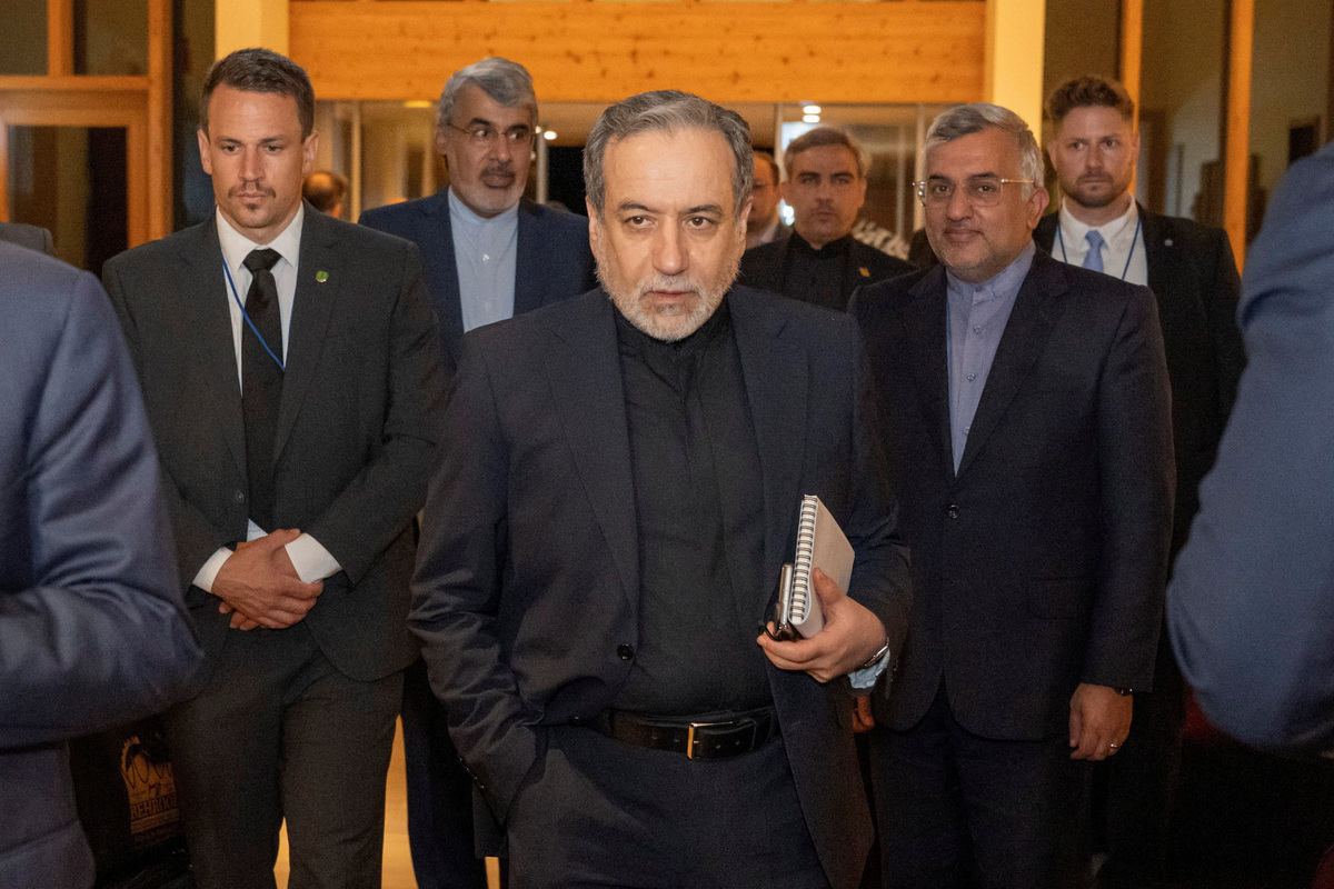 Minister of Foreign Affairs of Iran, Seyyed Abbas Araqchi, centre, at the Buergenstock resort in Obbuergen, near Lucerne, Switzerland, Sunday, June 20, 2026.   URS FLUEELER/Pool via REUTERS