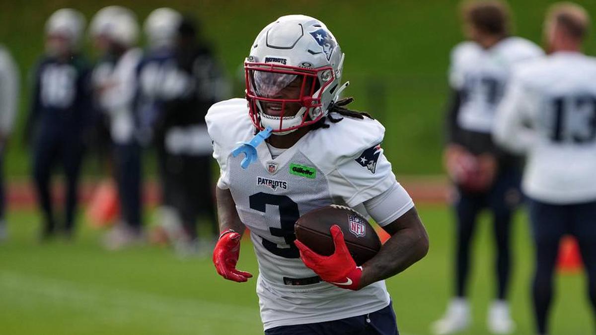  Oct 18, 2024; London, United Kingdom; New England Patriots wide receiver DeMario Douglas (3) carries the ball during practice at the Harrow School. Mandatory Credit: Kirby Lee-Imagn Images | Kirby Lee-Imagn Images 