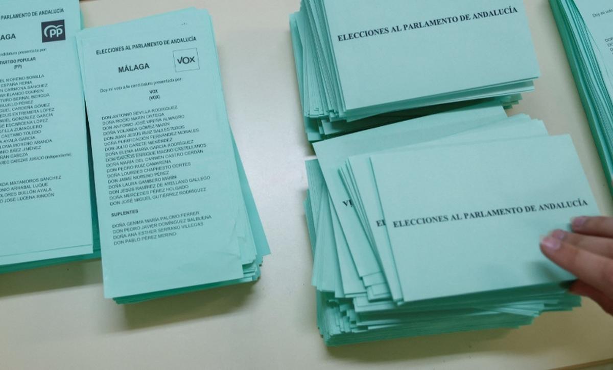 Ballots of People's Party and Spain's far-right Vox are kept on a table at a polling station during the Andalusian regional elections in Ronda, Spain May 17, 2026. REUTERS/Jon Nazca