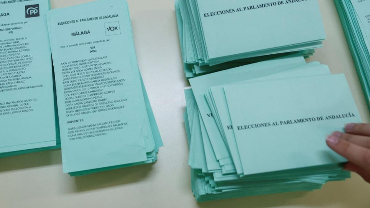Ballots of People's Party and Spain's far-right Vox are kept on a table at a polling station during the Andalusian regional elections in Ronda, Spain May 17, 2026. REUTERS/Jon Nazca