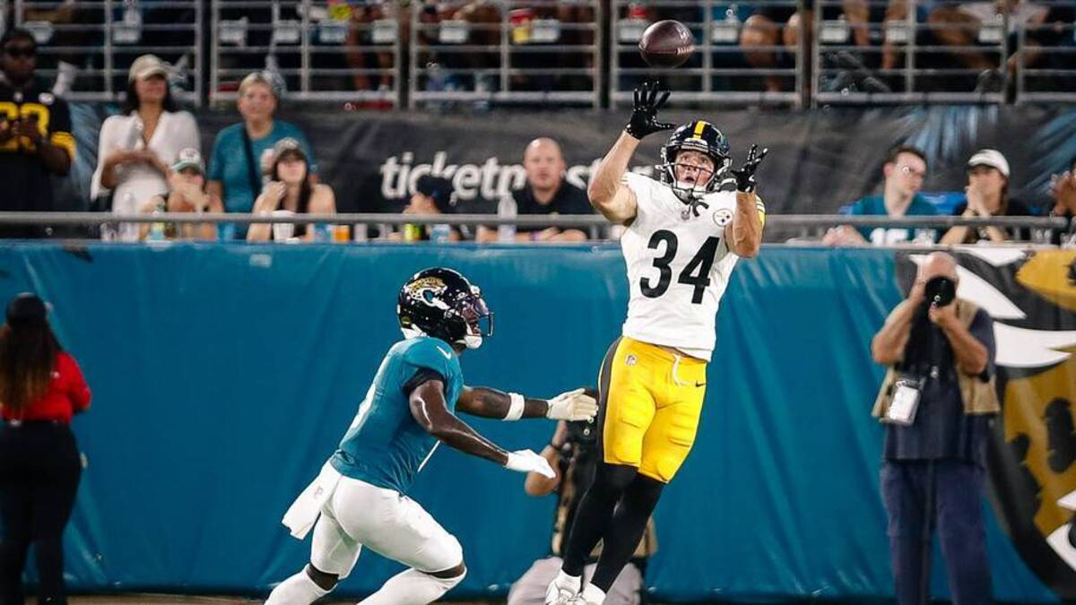  Aug 9, 2025; Jacksonville, Florida, USA; Pittsburgh Steelers running back Max Hurleman (34) catches a deep pass against the Jacksonville Jaguars during a preseason game at EverBank Stadium. Mandatory Credit: Travis Register-Imagn Images | Travis Register-Imagn Images 