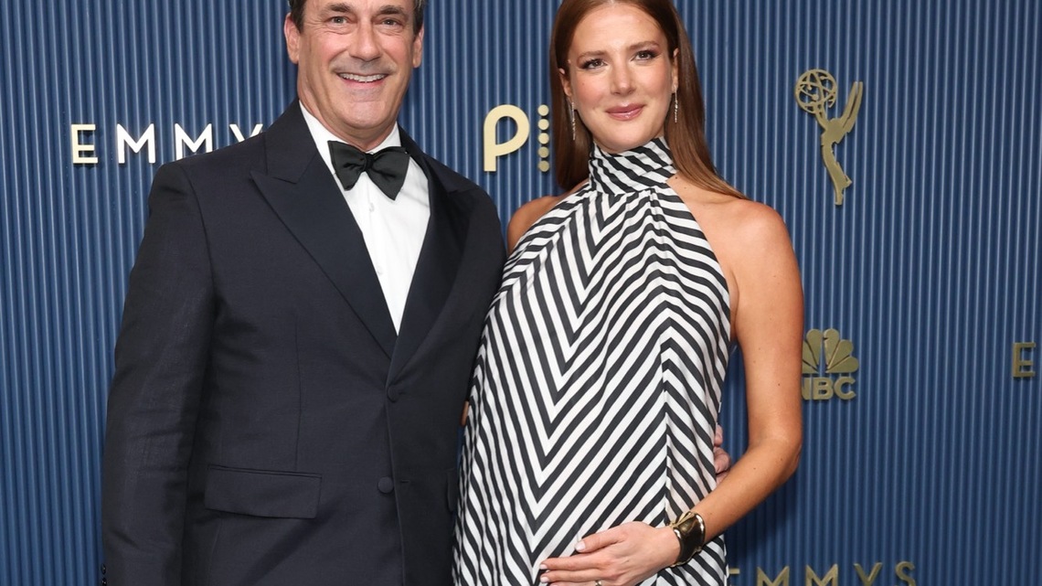 Jon Hamm's Wife Anna Shows Off Baby Bump In Chevron Dress at 2026 Emmys 