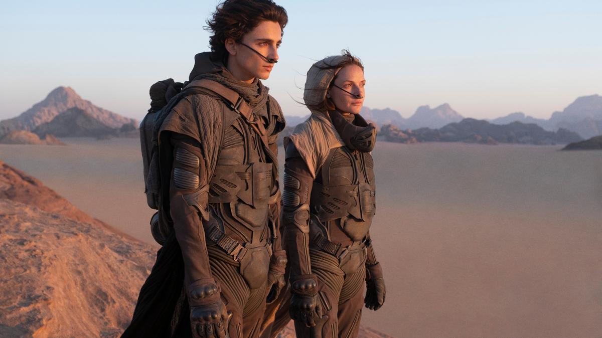 This image released by Warner Bros. Entertainment shows Timothee Chalamet, left, and Rebecca Ferguson in a scene from the 2021 film “Dune.”