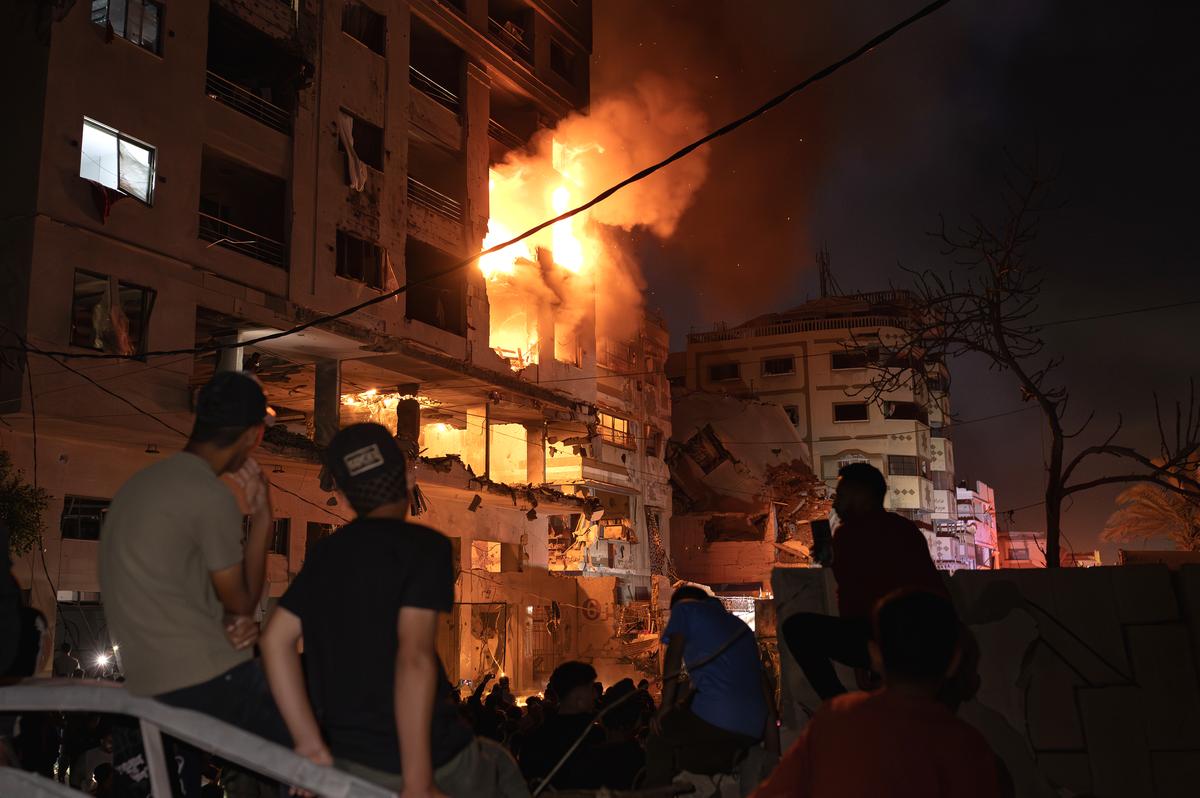 Israeli aircraft launched several strikes on an apartment building in the Al-Rimal neighborhood in central Gaza Strip, resulting in a number of casualties May 15, 2026. (Saher Alghorra/The New York Times)