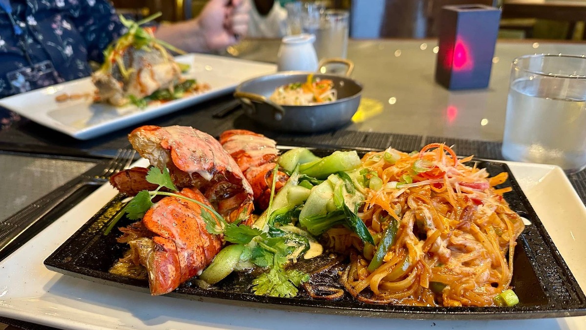  Angry Lobster Pad Thai is a flavorful feature on the Morimoto by Sea menu. 