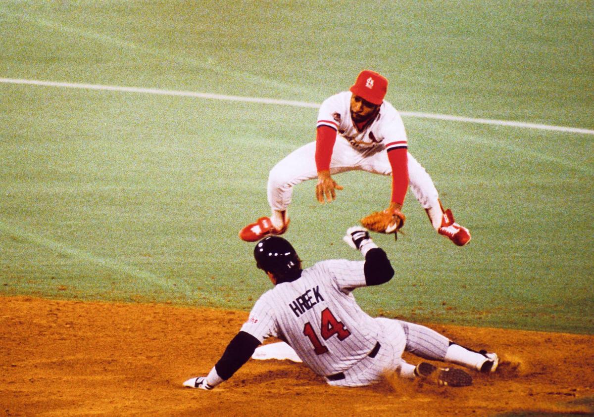  St. Louis Cardinals shortstop Ozzie Smith in action against Minnesota Twins first baseman Kent Hrbek during the 1987 World Series at Busch Stadium. Tony Tomsic-USA TODAY NETWORK
