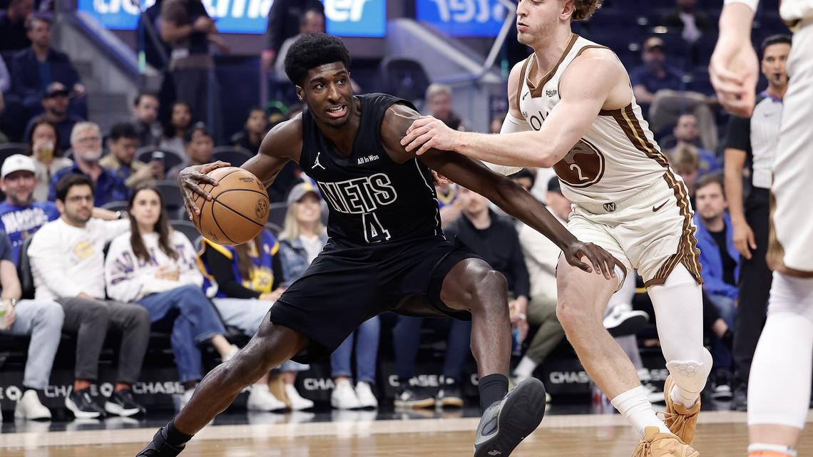 Warriors instant analysis: Golden State outlasts Nets, clinches play-in spot 