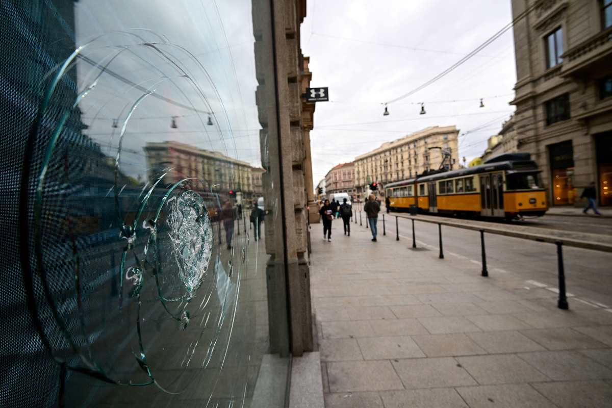 Milan luxury shops close for fear of new unrest as government prepares ...