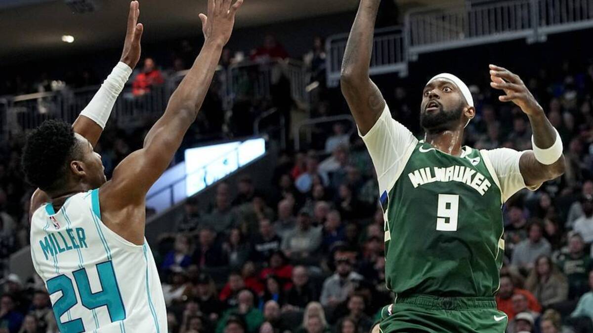  Bucks forward Bobby Portis gets ready to put up a floater over Hornets forward Brandon Miller during the first half Tuesday night at Fiserv Forum. | USA TODAY Network via Reuters Connect 