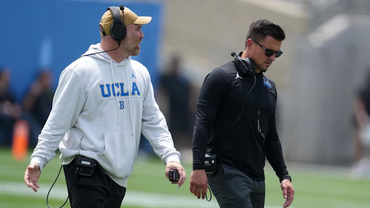  May 2, 2026; Pasadena, CA, USA; UCLA Bruins defensive coordinator Colin Hitschler (left) and head coach Bob Chesney during the spring game at Rose Bowl. Mandatory Credit: Kirby Lee-Imagn Images | Kirby Lee-Imagn Images 