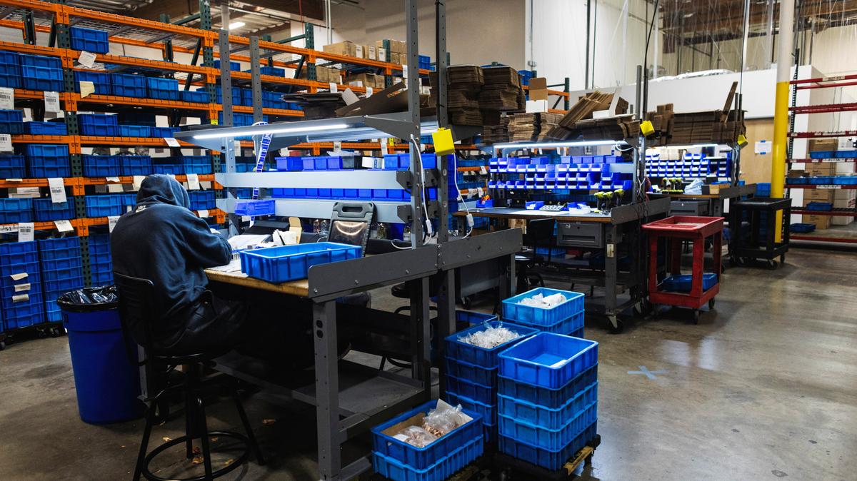 A worker makes locks at the Pacific Lock factory, which used to be located in Rye Canyon and is now located in a nearby business location, in Valencia, California, U.S. December 23, 2025.  REUTERS/Aude Guerrucci